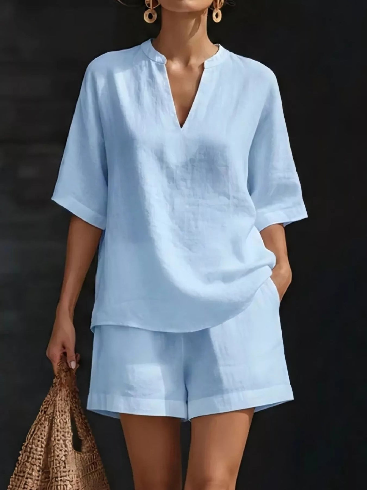 Plus size women's lounge set with notched collar half-sleeve top and matching shorts from Plush Fashion Hub.
