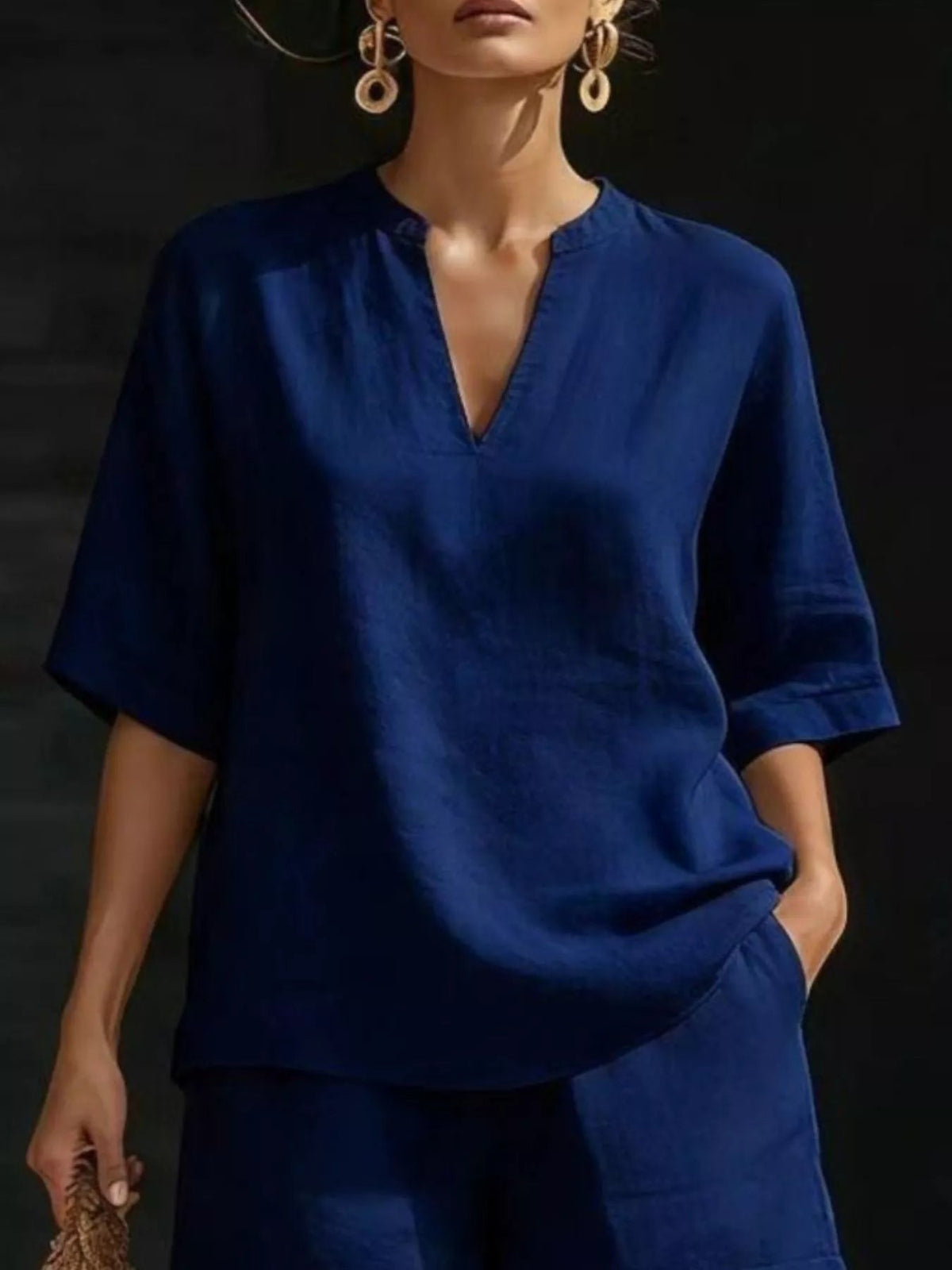 Plus size women's lounge set with notched collar half-sleeve top and matching shorts from Plush Fashion Hub.