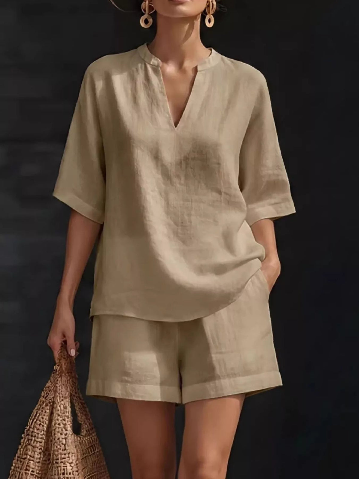 Plus size women's lounge set with notched collar half-sleeve top and shorts from Plush Fashion Hub, comfortable and stylish for relaxing.