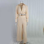 Plus size women's wide-leg elegant pant set by FitiqueFit, featuring a stylish casualwear ensemble with flowing wide-leg pants and a matching top.