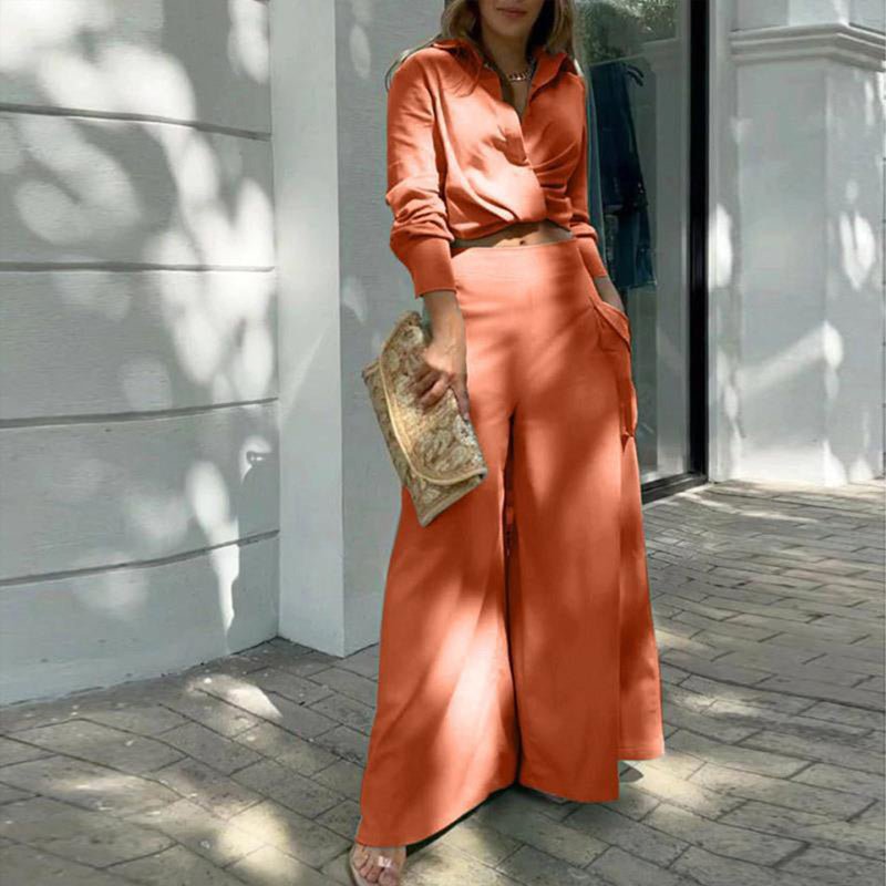 Plus size women's elegant wide-leg pant set by FitiqueFit, featuring a stylish casualwear look with flowing wide-leg pants.