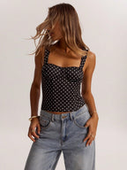 Women’s polka dot underwire camisole by FitiqueFit, a casualwear top ideal for parties and date nights, shown on a model.