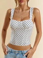 Women’s polka dot underwire camisole by FitiqueFit, casualwear top with adjustable straps and feminine polka dot pattern.