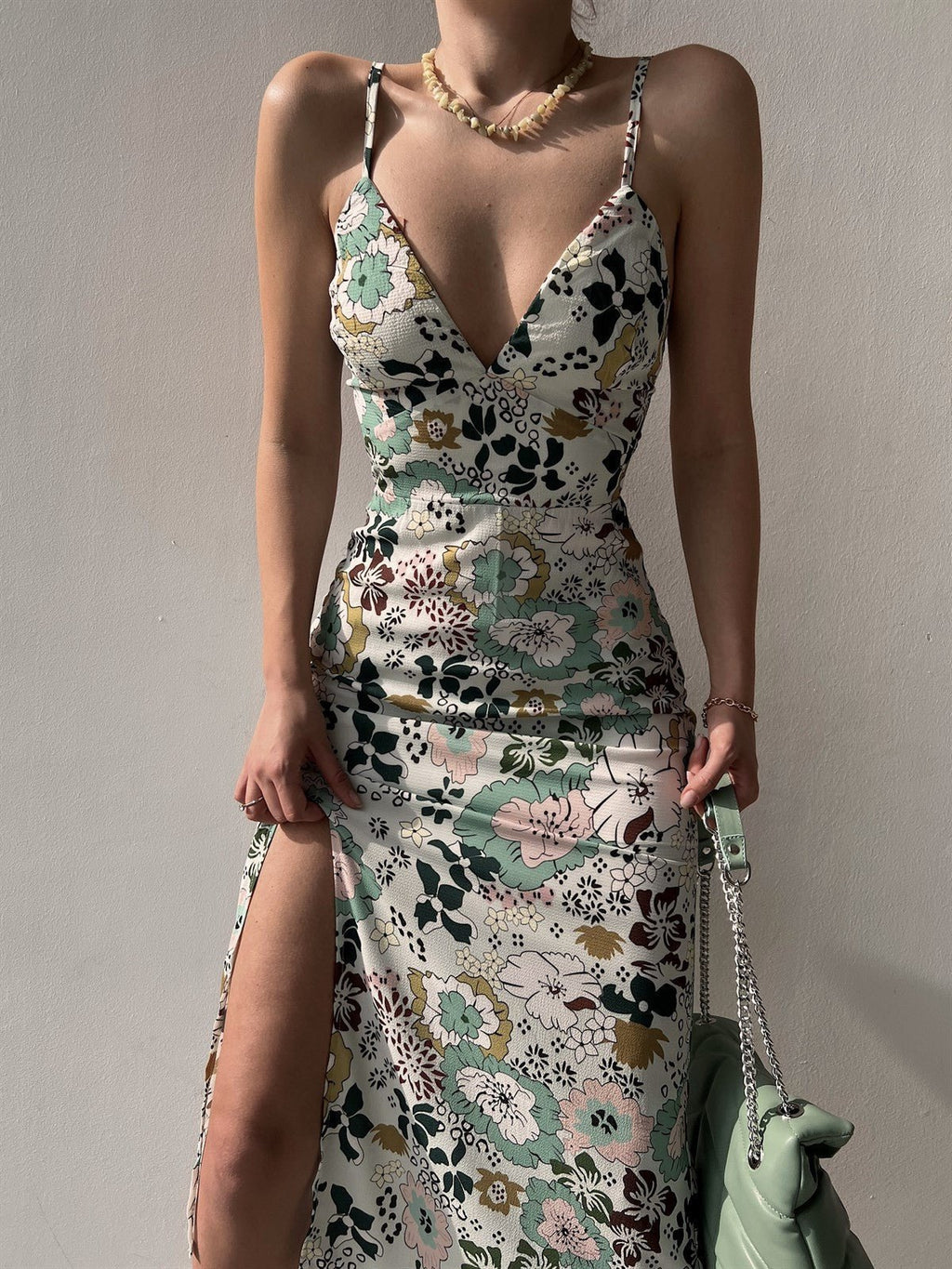 Women’s printed backless slit sling dress by FitiqueFit, casualwear with a stylish backless design and side slit.