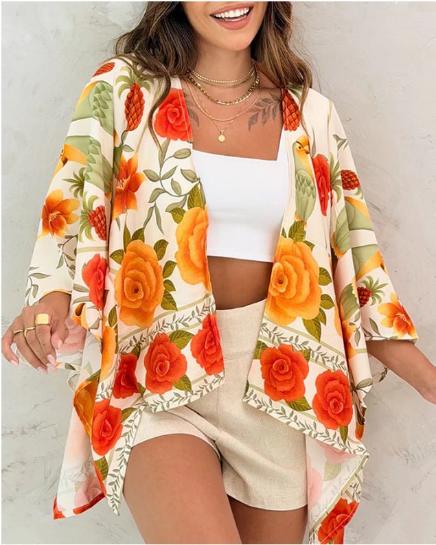 Women’s printed cardigan top with drop shoulder sleeves, casualwear by FitiqueFit, featuring colorful floral pattern and relaxed fit.