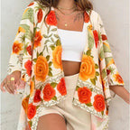 Women’s printed cardigan top with drop shoulder sleeves, casualwear by FitiqueFit, showcasing a colorful floral pattern and relaxed fit.