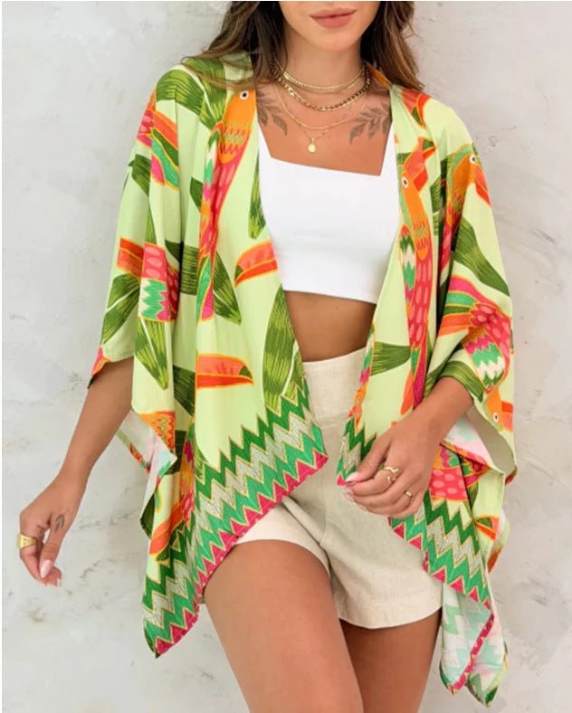 Women’s printed cardigan top with drop shoulder sleeves from FitiqueFit, casualwear style, featuring colorful floral pattern.