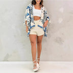 Women’s printed cardigan top with drop shoulder sleeves, casualwear by FitiqueFit, shown with floral print and relaxed fit.