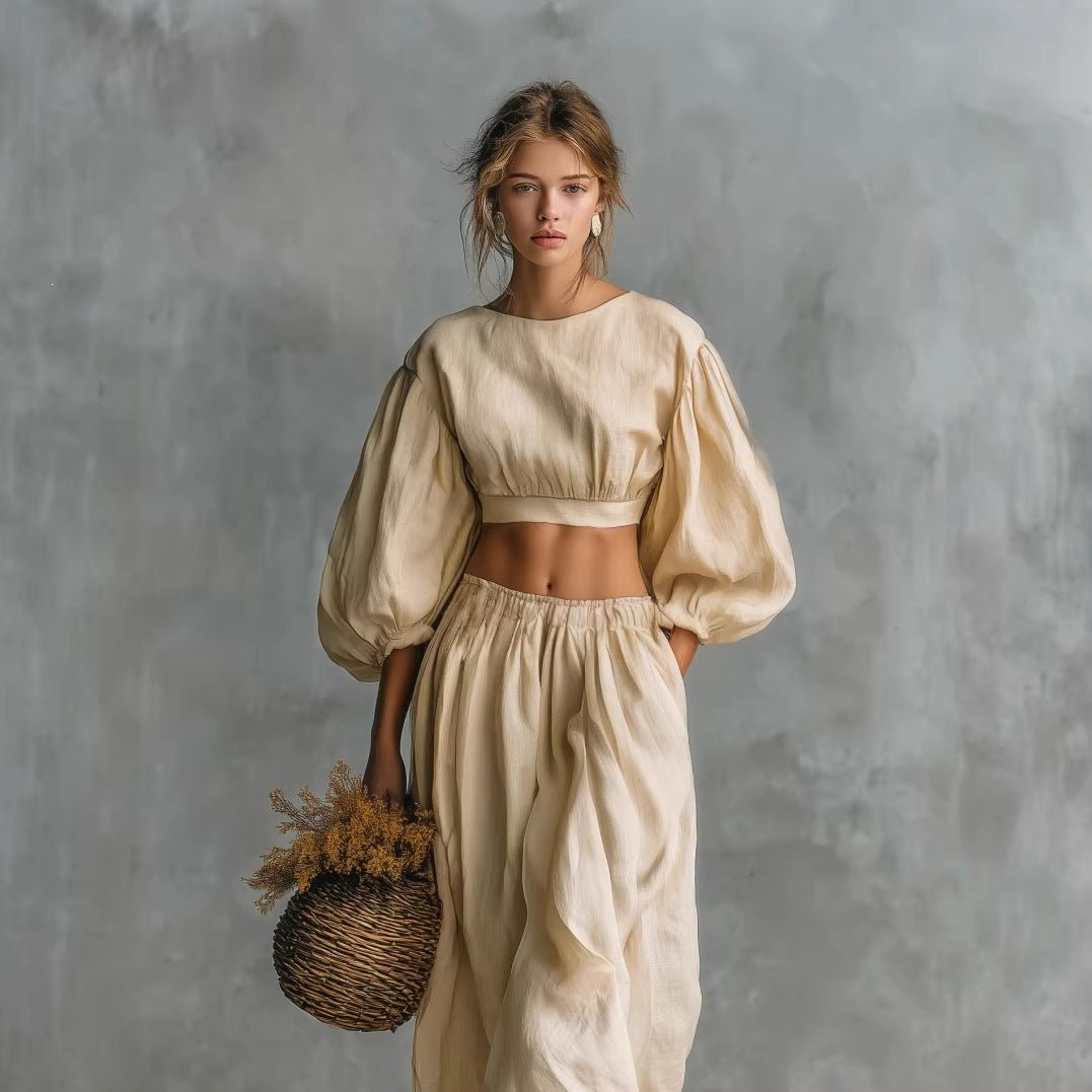 Women’s puff-sleeve crew-neck two-piece casualwear set with pockets, from Plush Fashion Hub, shown hanging on a hanger.