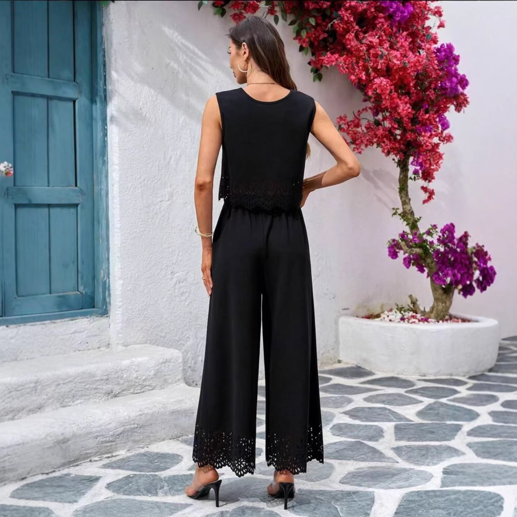 Women's resort-style hollow-out tank top and pants set by FitiqueFit, casualwear with pockets, perfect for relaxed summer days.