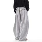 Women’s retro loose fit sweatpants by FitiqueFit, casualwear with relaxed fit and vintage-inspired style, shown in black fabric.