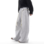 Women’s retro loose fit sweatpants by FitiqueFit, casualwear with relaxed fit and comfortable fabric, shown on a model.