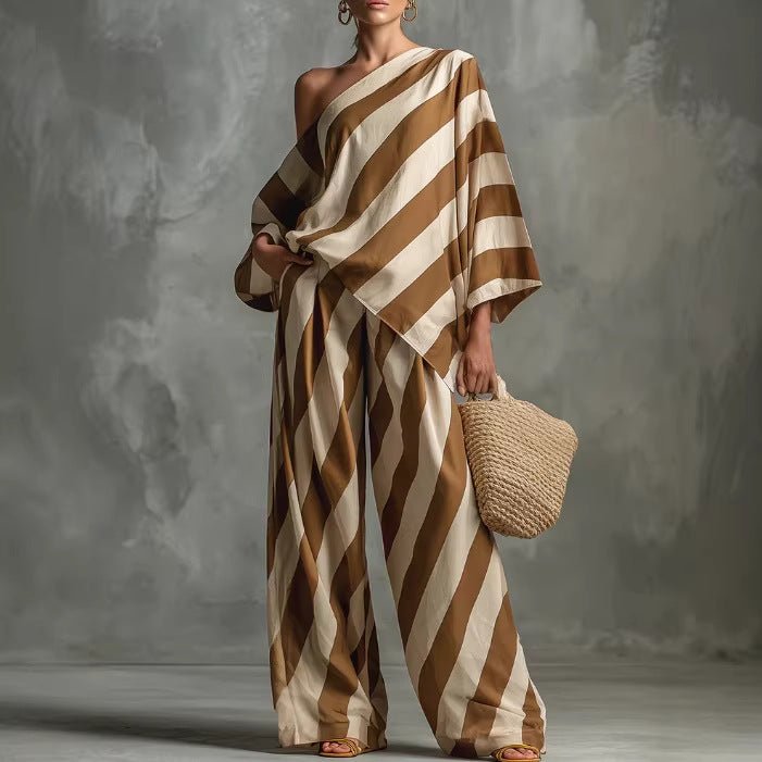 Women's retro striped batwing top and wide-leg pants set by FitiqueFit, casual vintage 2-piece outfit with bold stripes.