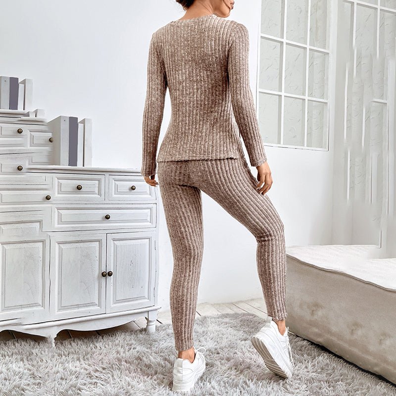 Women’s ribbed knit long-sleeve tee and pants lounge set by FitiqueFit, featuring comfortable casualwear in a soft fabric.