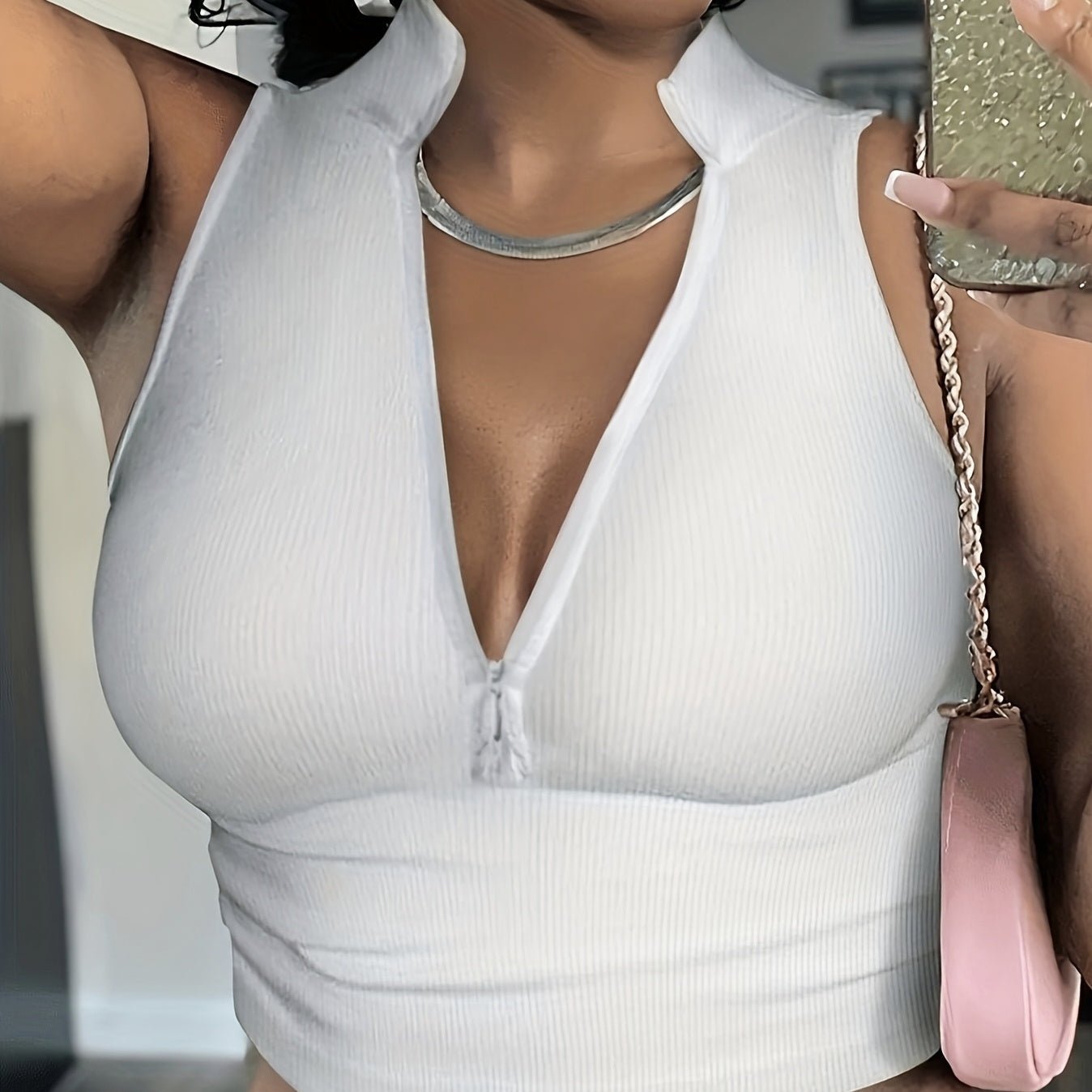 Women's ribbed V-neck zipper camisole from FitiqueFit, casualwear, showing the fitted ribbed fabric and V-neck design.