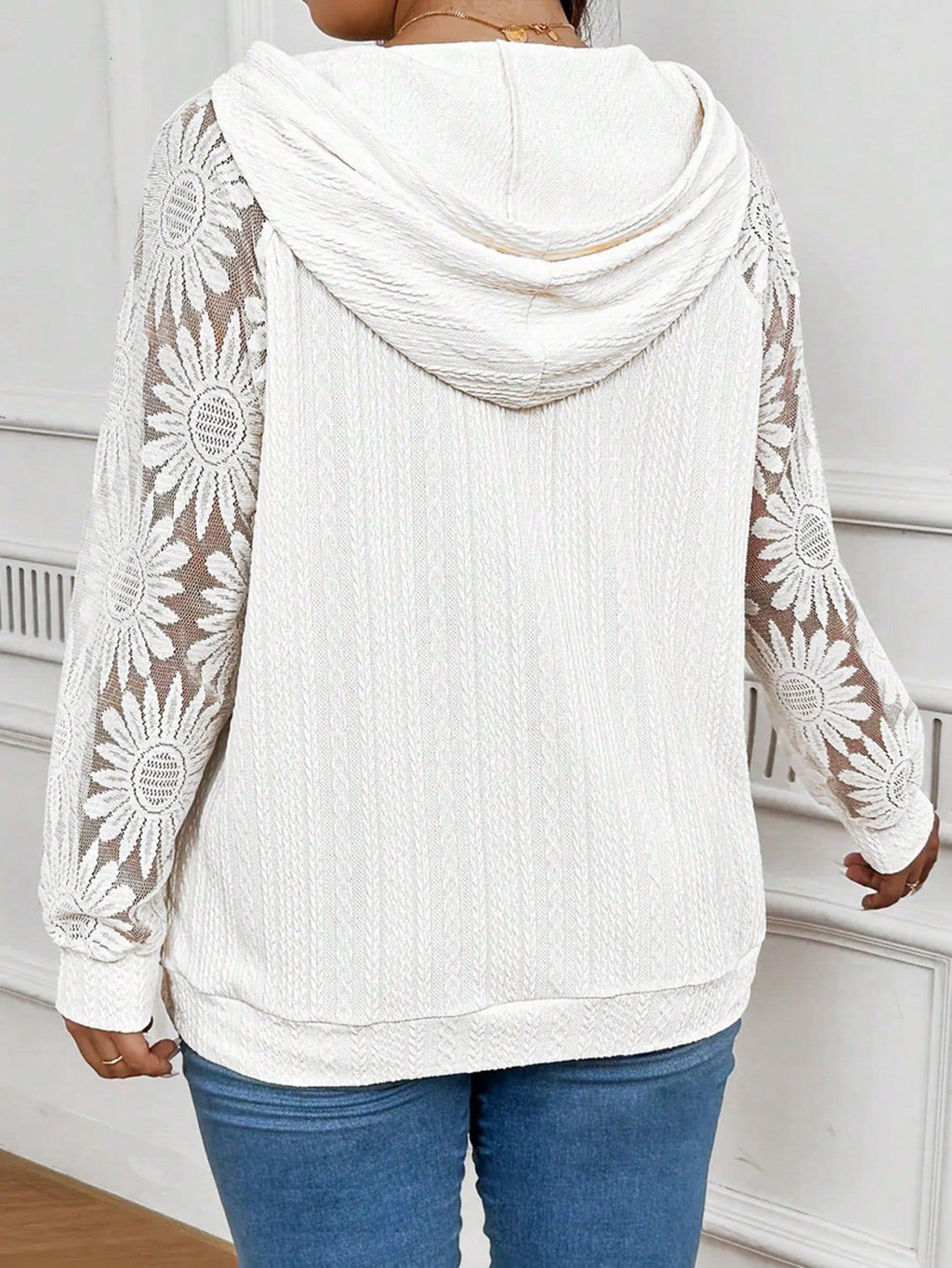 White women's long sleeve hoodie with round neck and lace paneling, featuring hollow-out details and a comfortable fit.