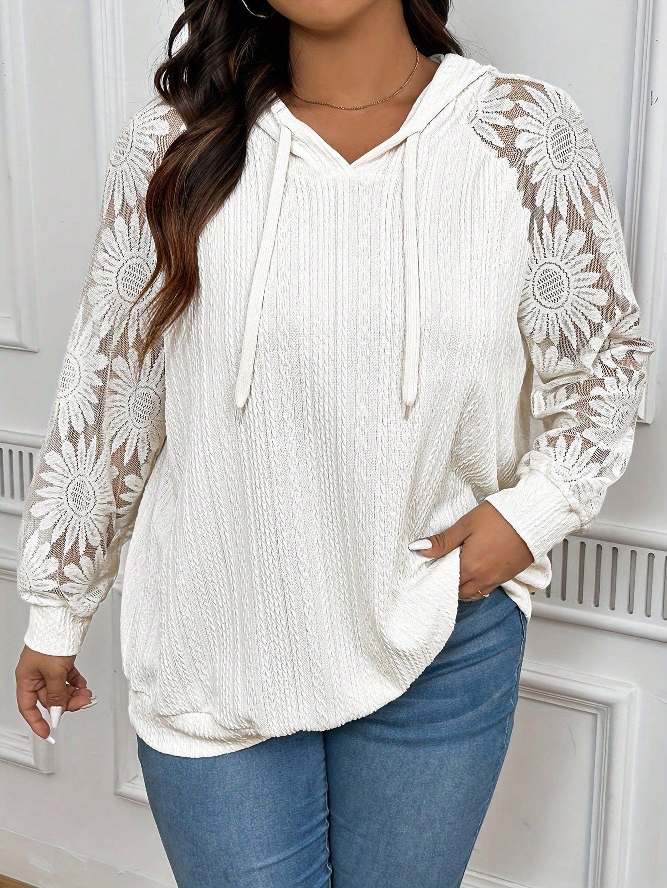 White women's hoodie with round neck, hollow-out lace paneling, and long sleeves by FitiqueFit.