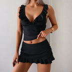 Women's ruffle trim three-piece bikini swimsuit set by FitiqueFit, featuring a ruffled top, bottoms, and cover-up in casual swimwear style.