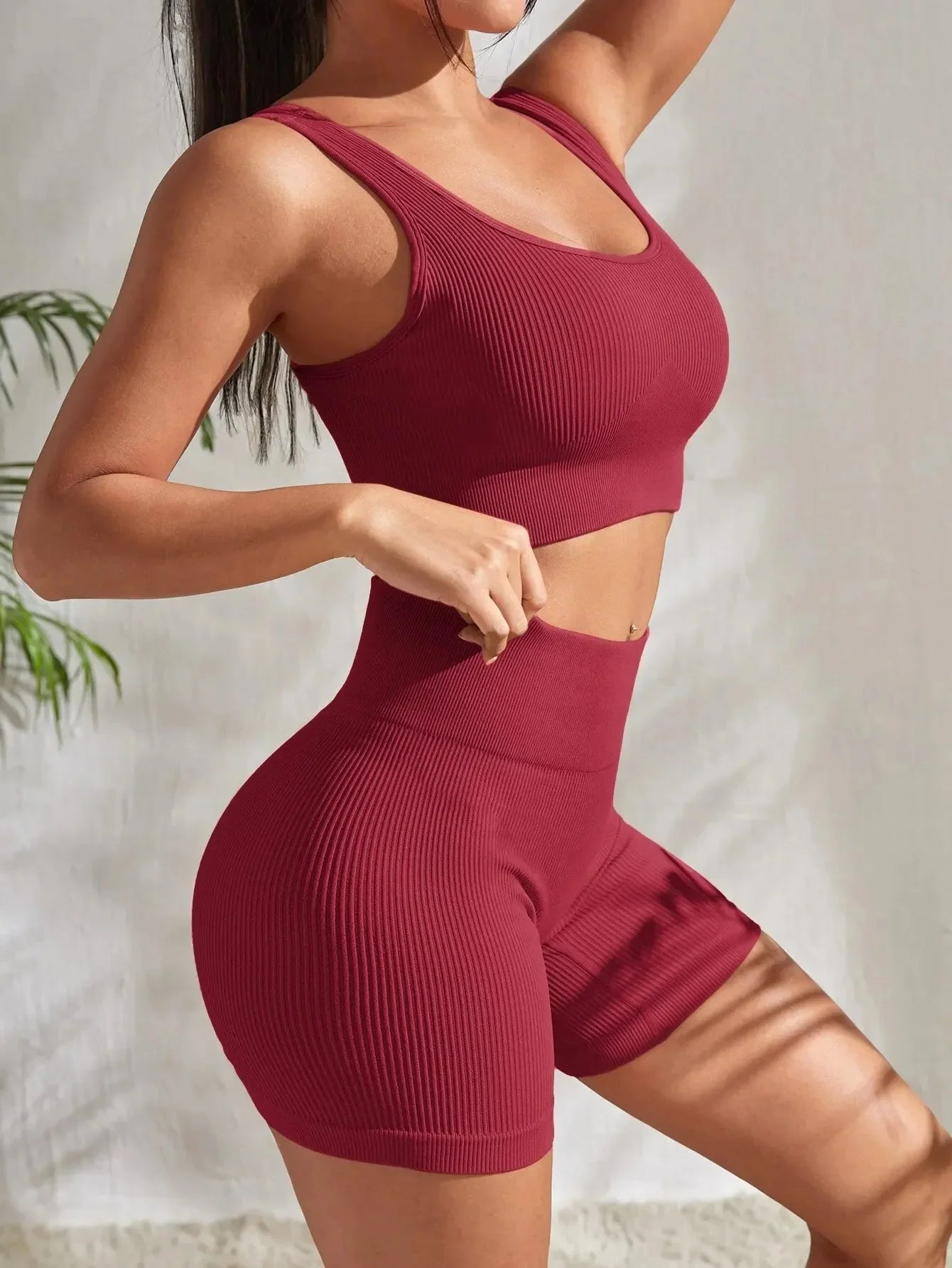Women’s seamless ribbed yoga set from FitiqueFit, featuring a fitted top and matching high-waisted leggings for activewear.