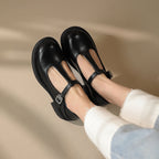 Women's shallow-mouth Mary Jane shoes by FitiqueFit, featuring a classic closed-toe design and comfortable strap on stylish footwear.