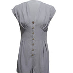 Women’s casual FitiqueFit short button-front jumpsuit with V-neck and patchwork design, perfect for stylish everyday wear.