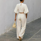 Women’s casual two-piece outfit with a short top and high-waisted pants from FitiqueFit, styled for a relaxed, modern look.