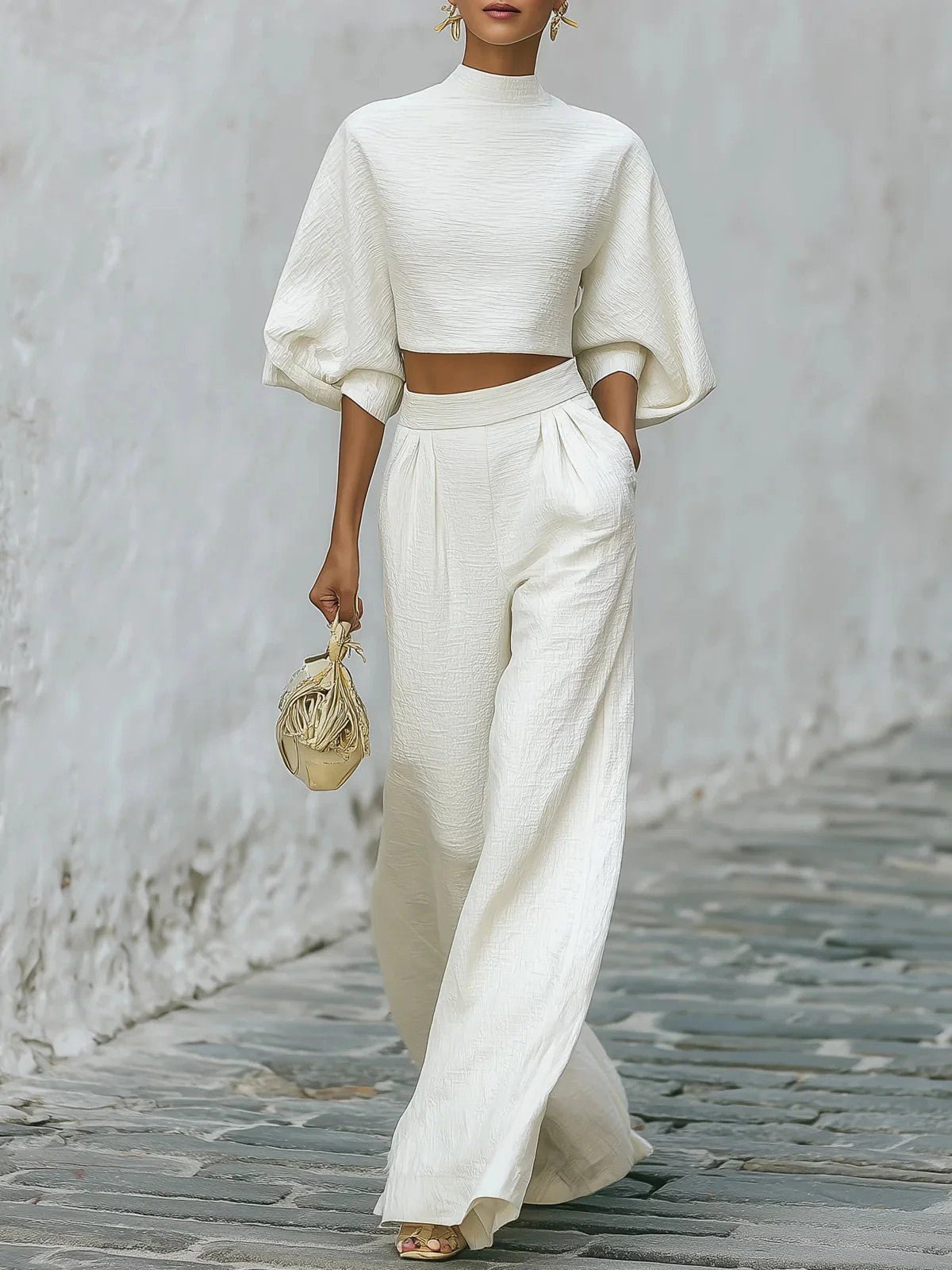 Women's casual two-piece outfit featuring a short top and high-waisted pants by FitiqueFit, stylish and comfortable for everyday wear.