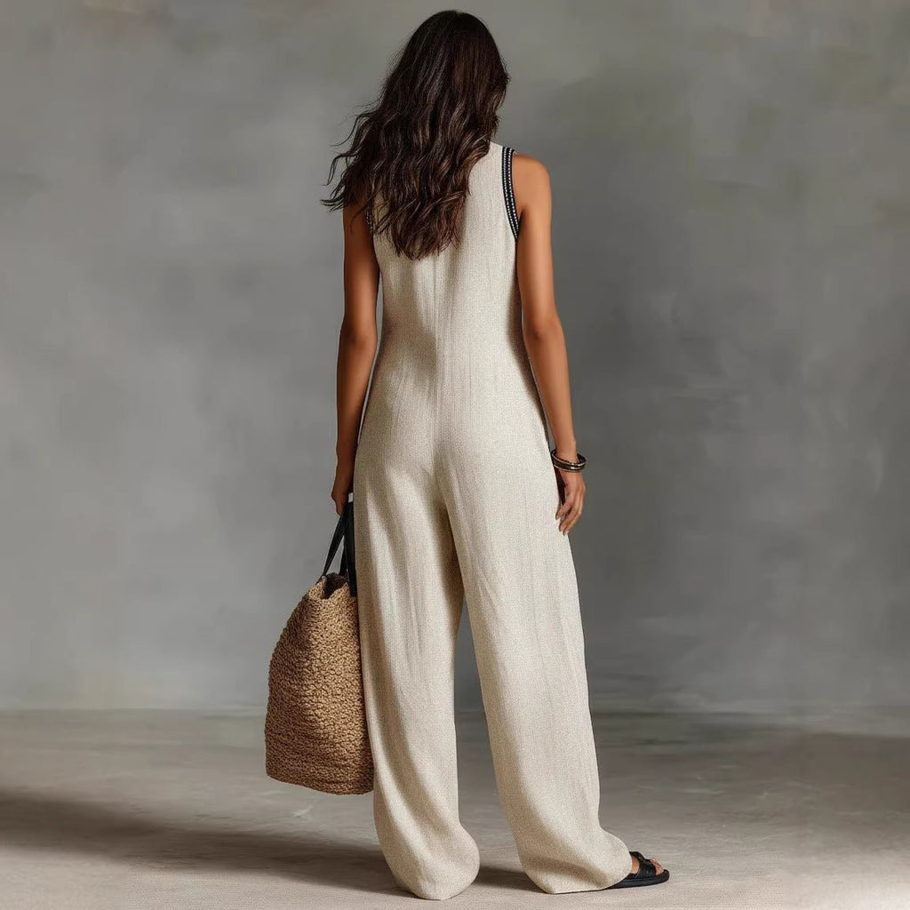 Women’s linen-blend sleeveless jumpsuit by FitiqueFit, casualwear with a relaxed fit and simple design, shown on a model.