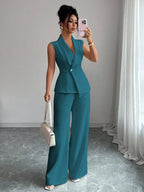 Women's sleeveless blazer and straight-leg pants two-piece casualwear set by FitiqueFit, shown on a model.