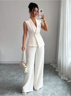 Women's sleeveless blazer and straight-leg pants two-piece set by FitiqueFit, casualwear style, displayed on a model.