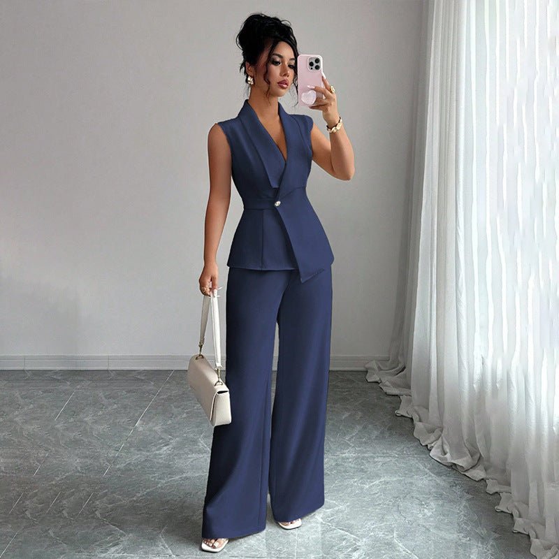 Women’s sleeveless blazer and straight-leg pants two-piece casualwear set by FitiqueFit, shown on a model with neutral background.