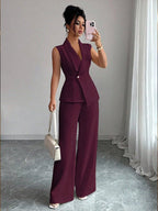 Women's sleeveless blazer and straight-leg pants two-piece set by FitiqueFit, casualwear, shown in a stylish, coordinated outfit.