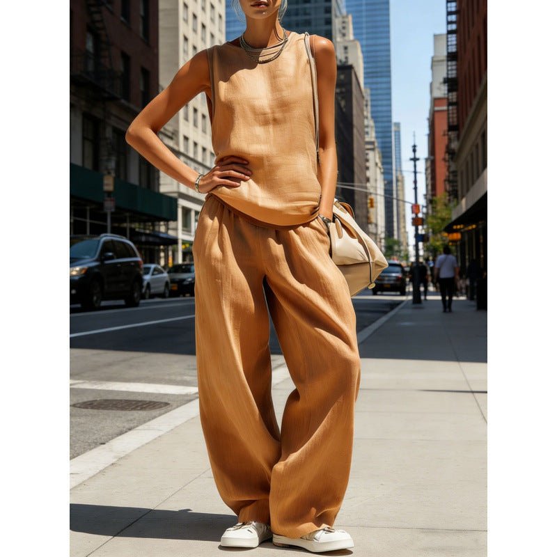 Women's sleeveless cardigan top and matching pants two-piece casualwear set by FitiqueFit, shown in a relaxed fit and neutral color.