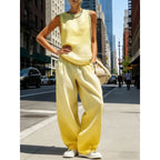 Women's sleeveless cardigan top and matching pants two-piece casualwear set by FitiqueFit, styled for comfortable everyday wear.