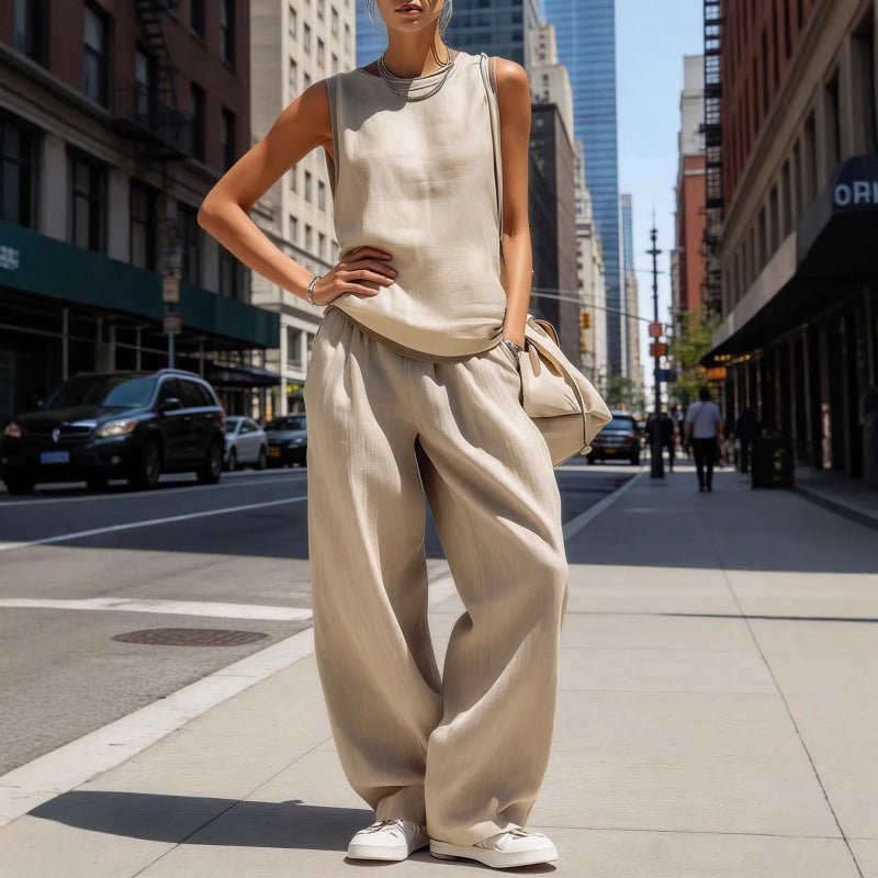 Women’s sleeveless cardigan top and pants two-piece casualwear set by FitiqueFit, featuring a lightweight sleeveless cardigan and matching pants.