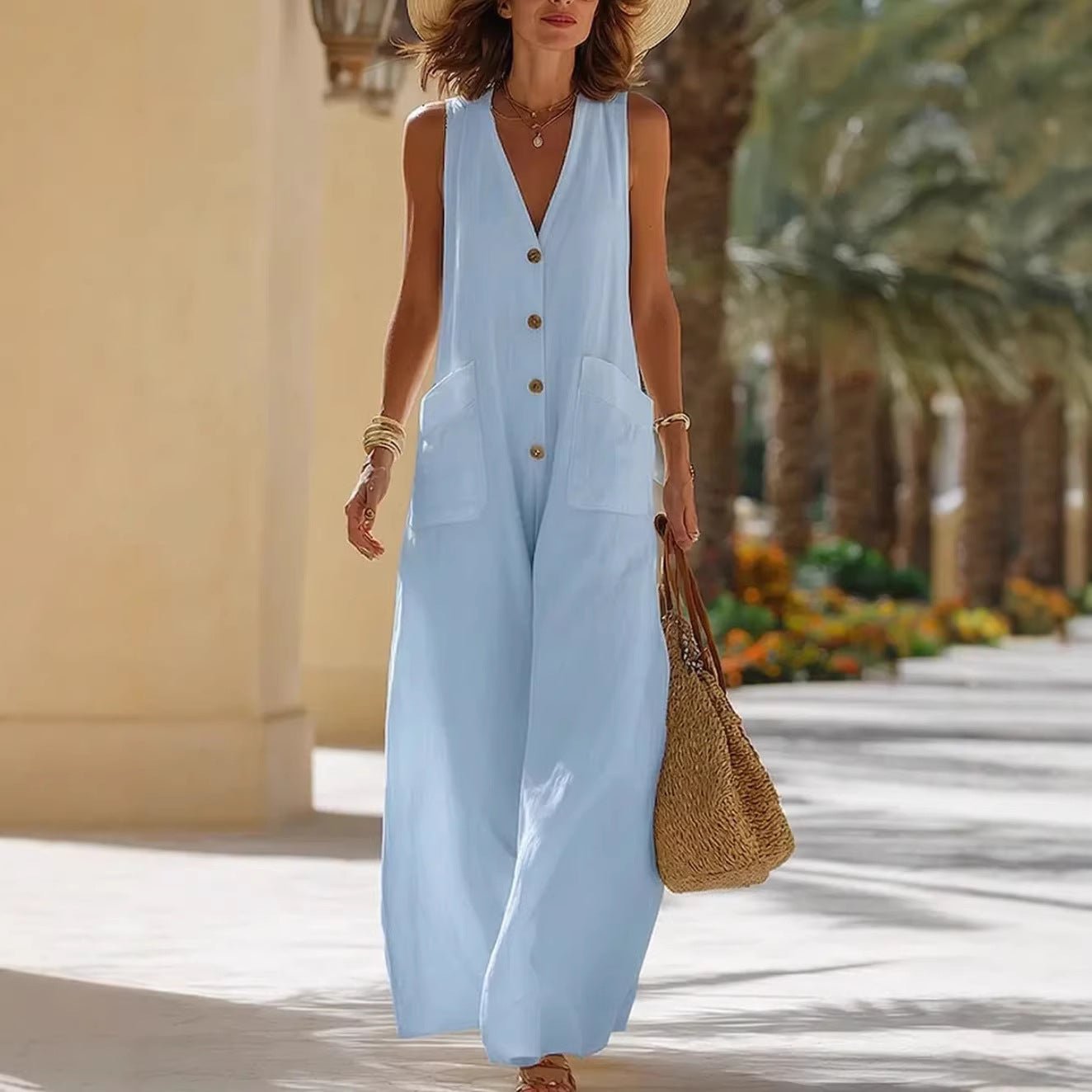 Women's sleeveless cotton linen wide-leg jumpsuit with button pockets, casualwear from FitiqueFit, displayed on a model.