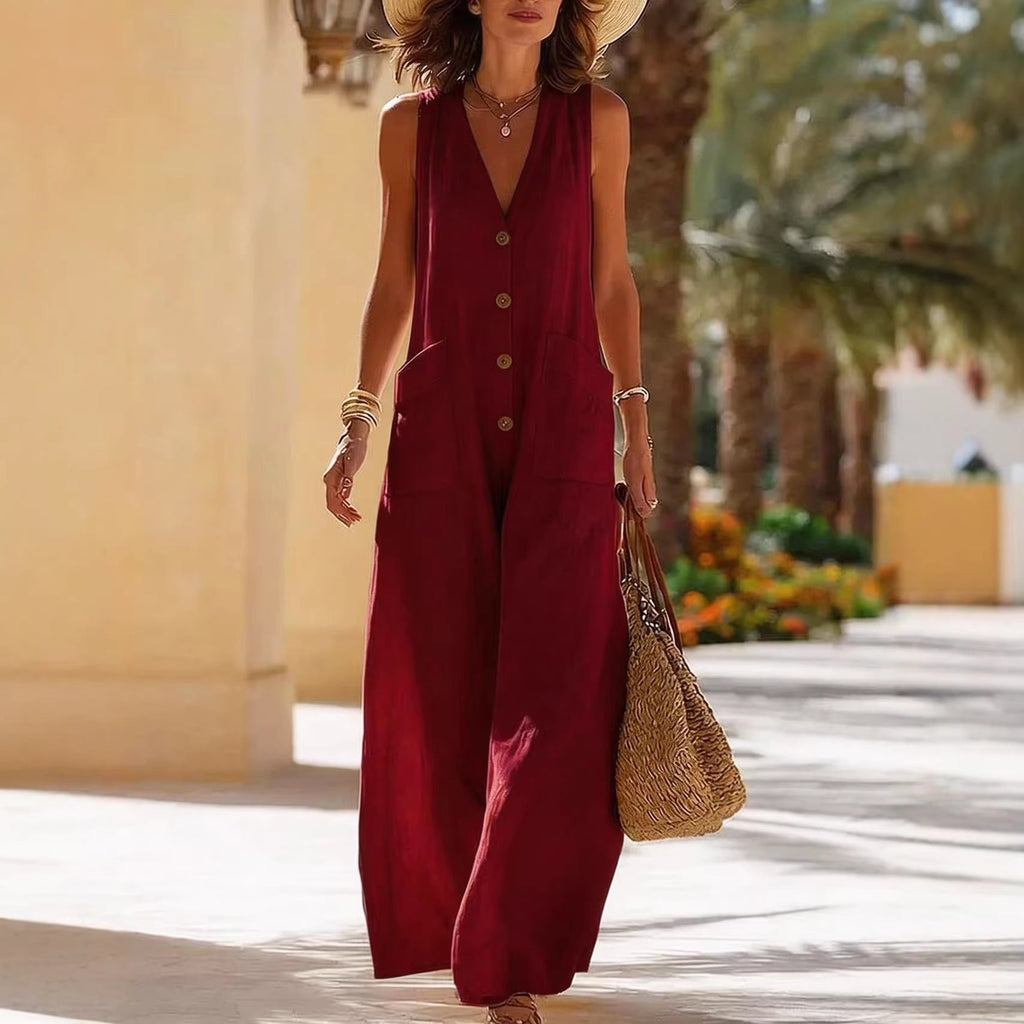 Women's sleeveless cotton linen wide-leg jumpsuit with button pockets, casualwear by FitiqueFit, shown on a model.