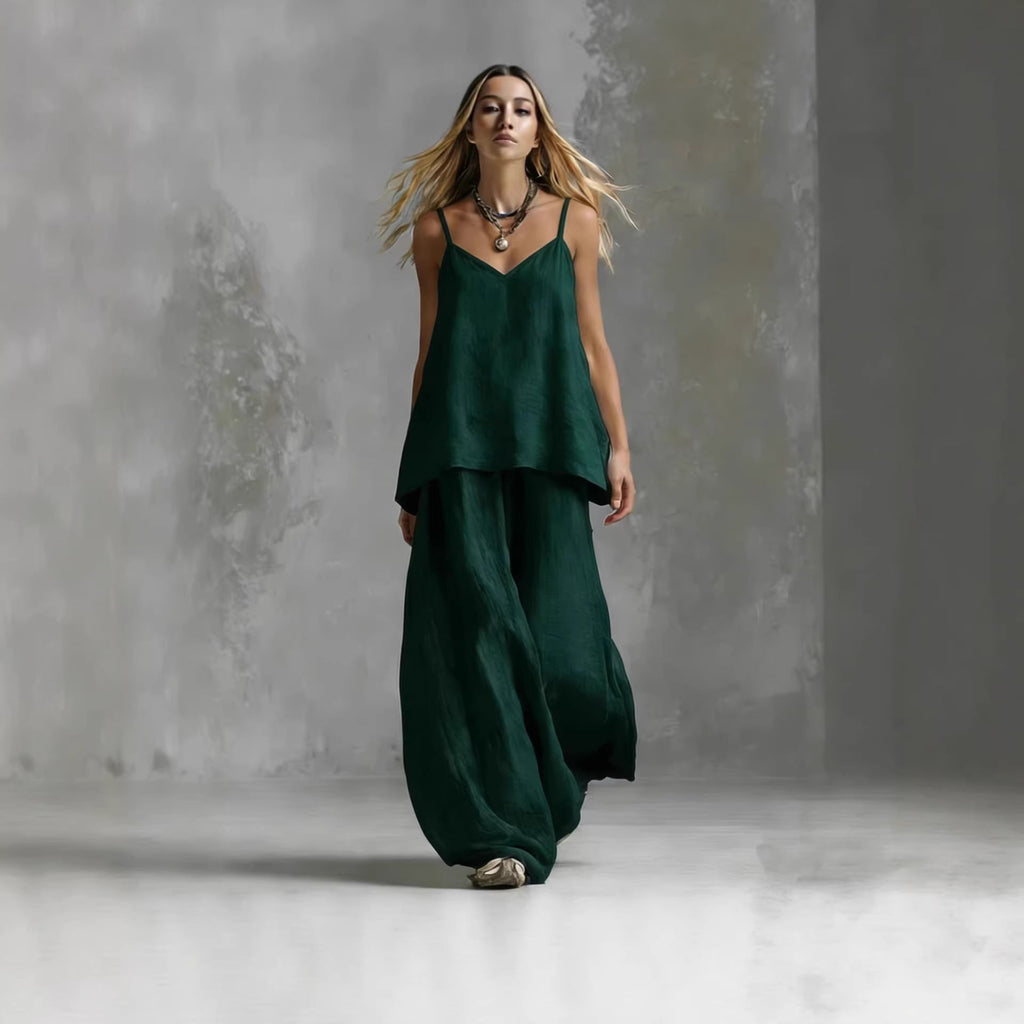 Women's sleeveless off-shoulder elegant pantsuit by FitiqueFit, featuring a stylish 2-piece casualwear set with tailored pants and top.
