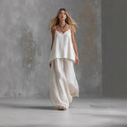 Women's sleeveless off-shoulder elegant pantsuit by FitiqueFit, featuring a stylish two-piece casualwear set with tailored pants and a matching top.
