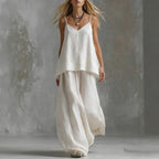 Women's sleeveless off-shoulder elegant pantsuit by FitiqueFit, featuring a stylish 2-piece set perfect for casual wear.