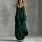 Women's sleeveless off-shoulder elegant pantsuit by FitiqueFit, featuring a stylish 2-piece casualwear set with tailored pants and top.