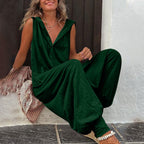 Women’s sleeveless hooded relaxed-fit jumpsuit by FitiqueFit, featuring a casual, comfortable design with a hood and sleeveless style.