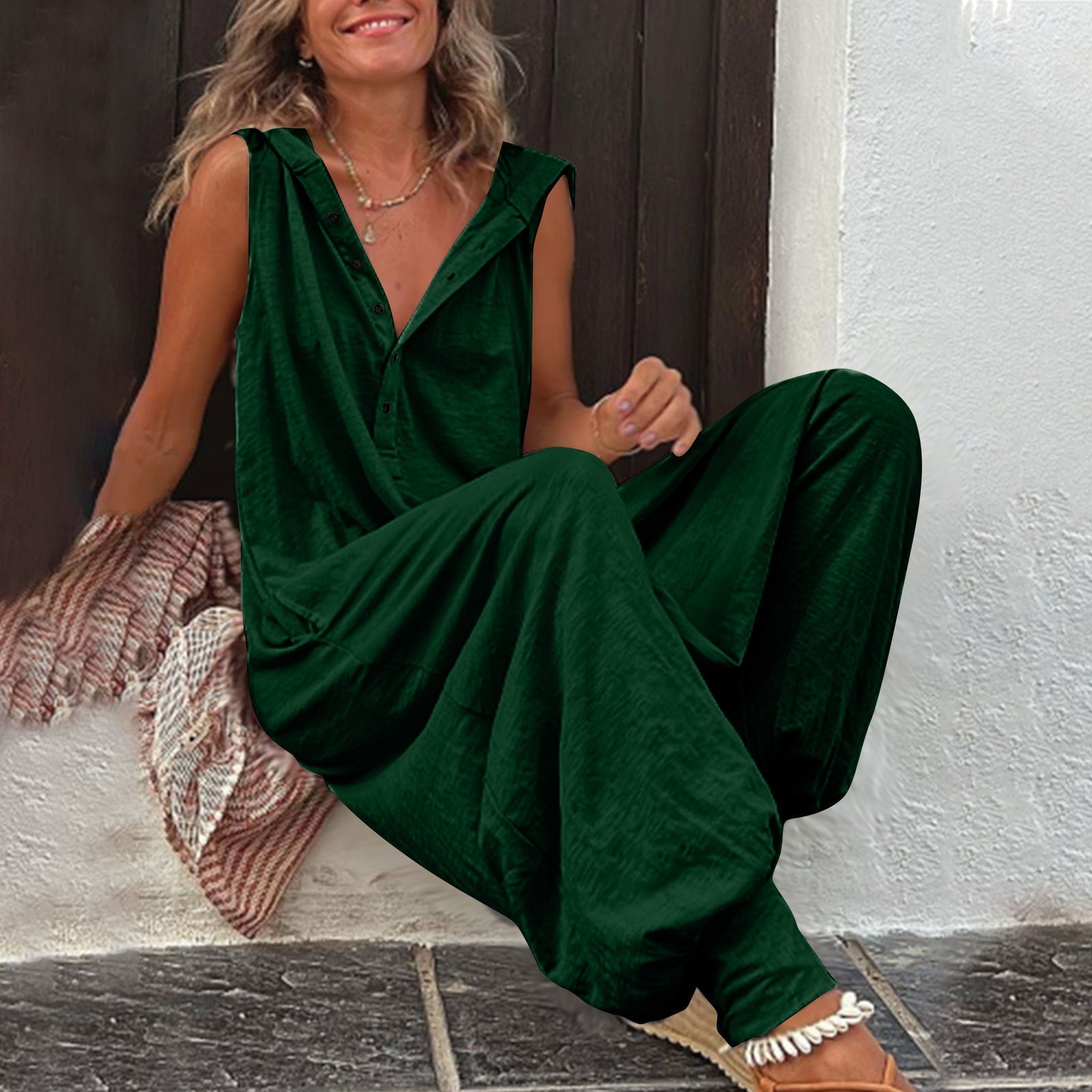 Women’s sleeveless hooded relaxed-fit jumpsuit by FitiqueFit, featuring a casual, comfortable design with a hood and sleeveless style.