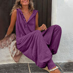 Women's sleeveless hooded relaxed fit jumpsuit from FitiqueFit, casualwear with a comfortable, stylish design and front pockets.