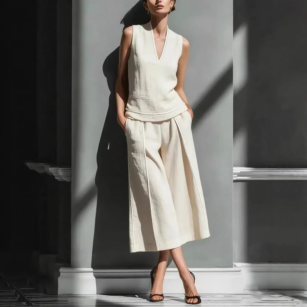 Women's sleeveless linen shirt and cropped pants set by FitiqueFit, casual 2-piece outfit, perfect for warm weather.