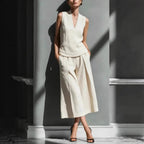 Women's sleeveless linen shirt and cropped pants set by FitiqueFit, casual 2-piece outfit, perfect for warm weather.