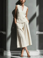 Women's sleeveless linen shirt and cropped pants set by FitiqueFit, casual 2-piece outfit, perfect for warm weather.