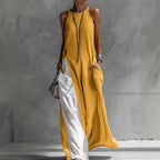Women's sleeveless loose casual dress with contrast colors and pockets by FitiqueFit, ideal for everyday wear.