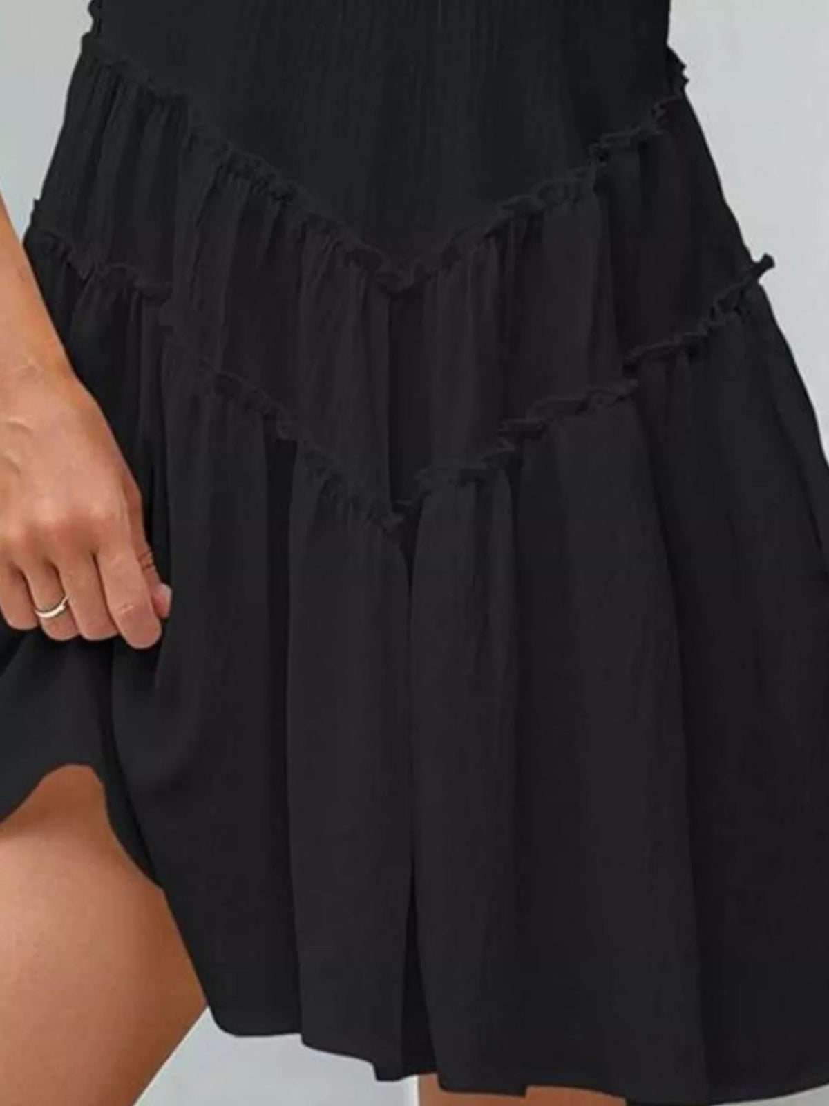 Women’s sleeveless round neck mini dress with pockets by Plush Fashion Hub, featuring a casual fit and stylish design.