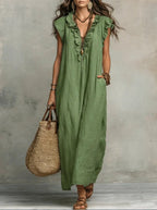 Women's sleeveless ruffle pocket maxi dress by Plush Fashion Hub, casualwear with flowing fabric and stylish ruffle details.